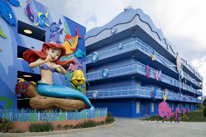 Surrounded by Flounder and friends, a larger-than-life Ariel overlooks "The Little Mermaid" courtyard and Flippin’ Fins pool at Disney's Art of Animation Resort. Beginning Sept. 15, 2012, guests can dive "under the sea" with Ariel and become part of her world when the resort's final phase opens with 864 standard hotel rooms.  Disney's Art of Animation Resort is a value property located at Walt Disney World Resort in Lake Buena Vista, Fla. (Matt Stroshane, photographer)